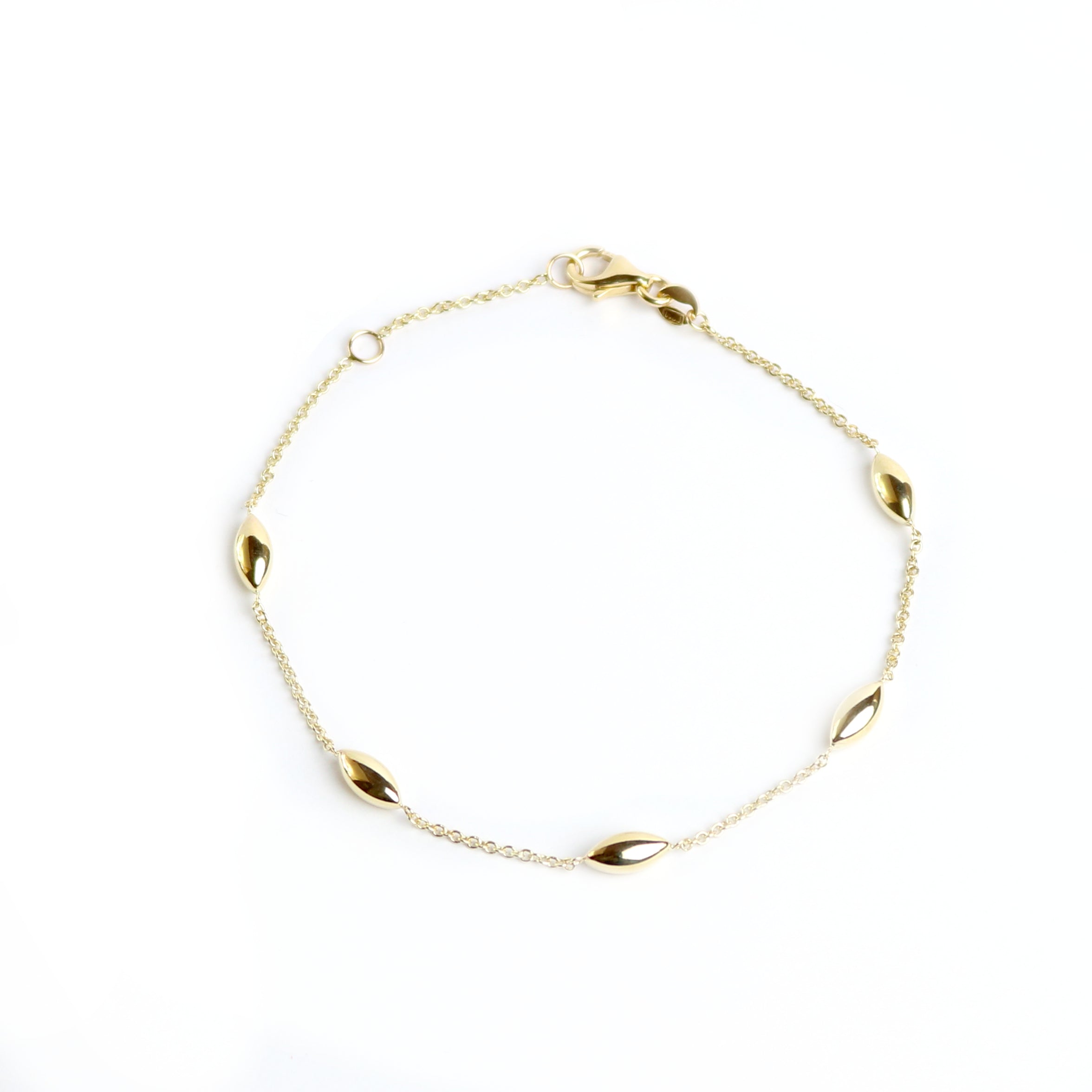 WILHELM MÜLLER - Armkette in Gold mit Erbsanhängern - Juwelier Donkel