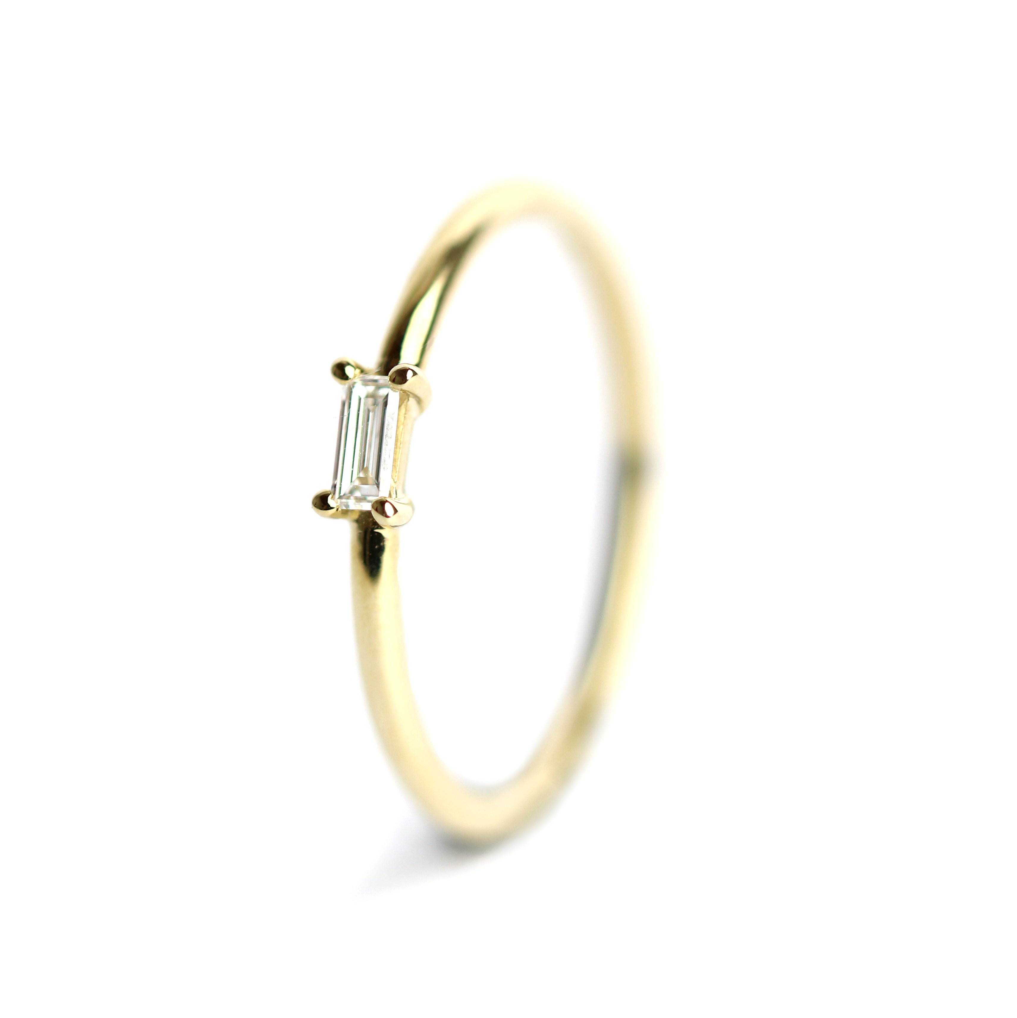 WILHELM MÜLLER - Ring in Gold mit Baguette Diamant 0,10ct - Juwelier Donkel