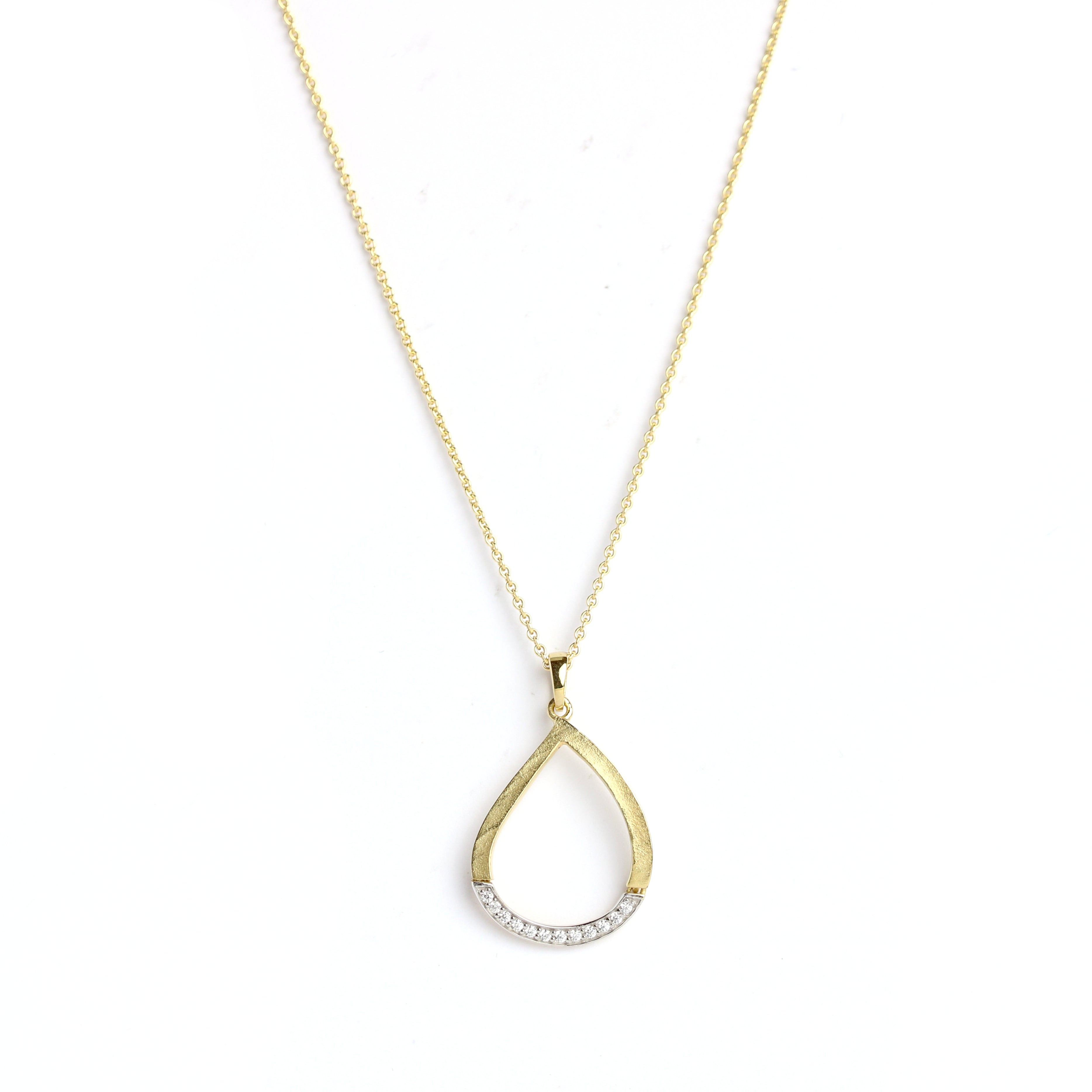 Anhänger in Gold mit Tropfenform und Zirkonia